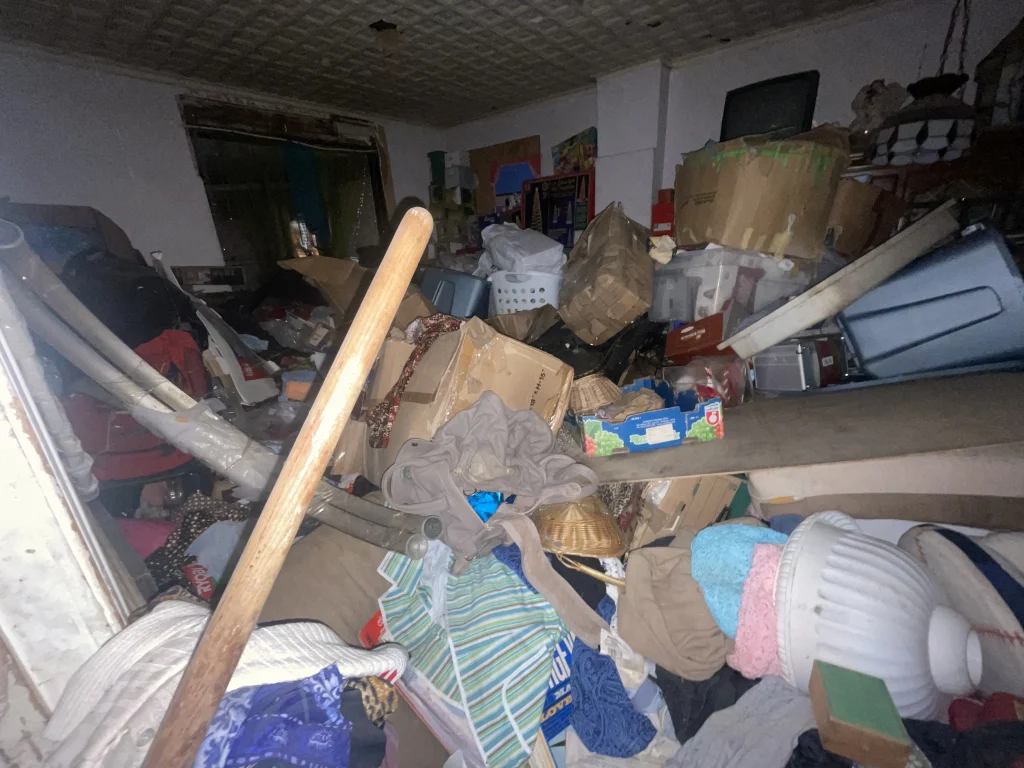 Piles of junk inside a hoarder home